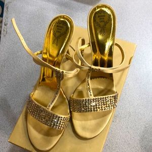 Gold Italian Rodo shoes.